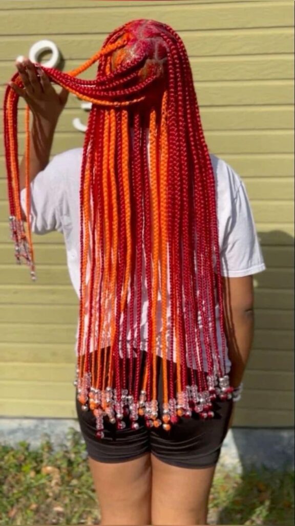  Medium-colored box braids with beads